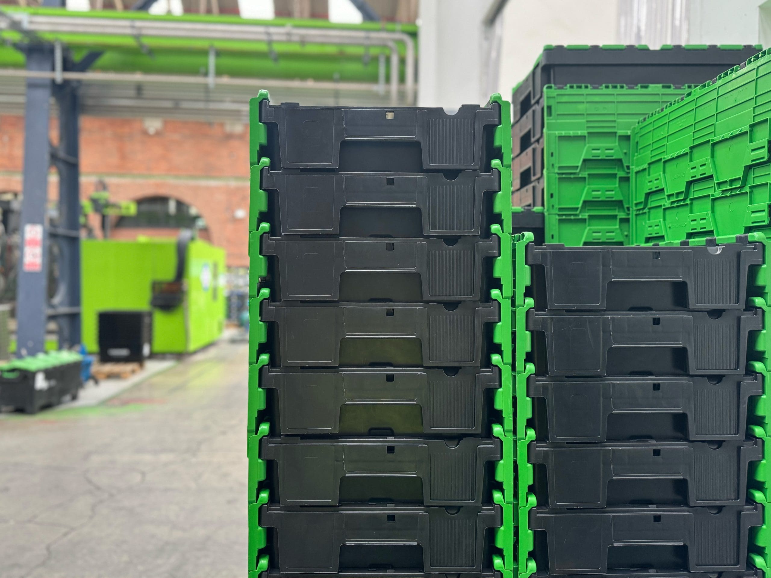 distribution totes nested in a warehouse