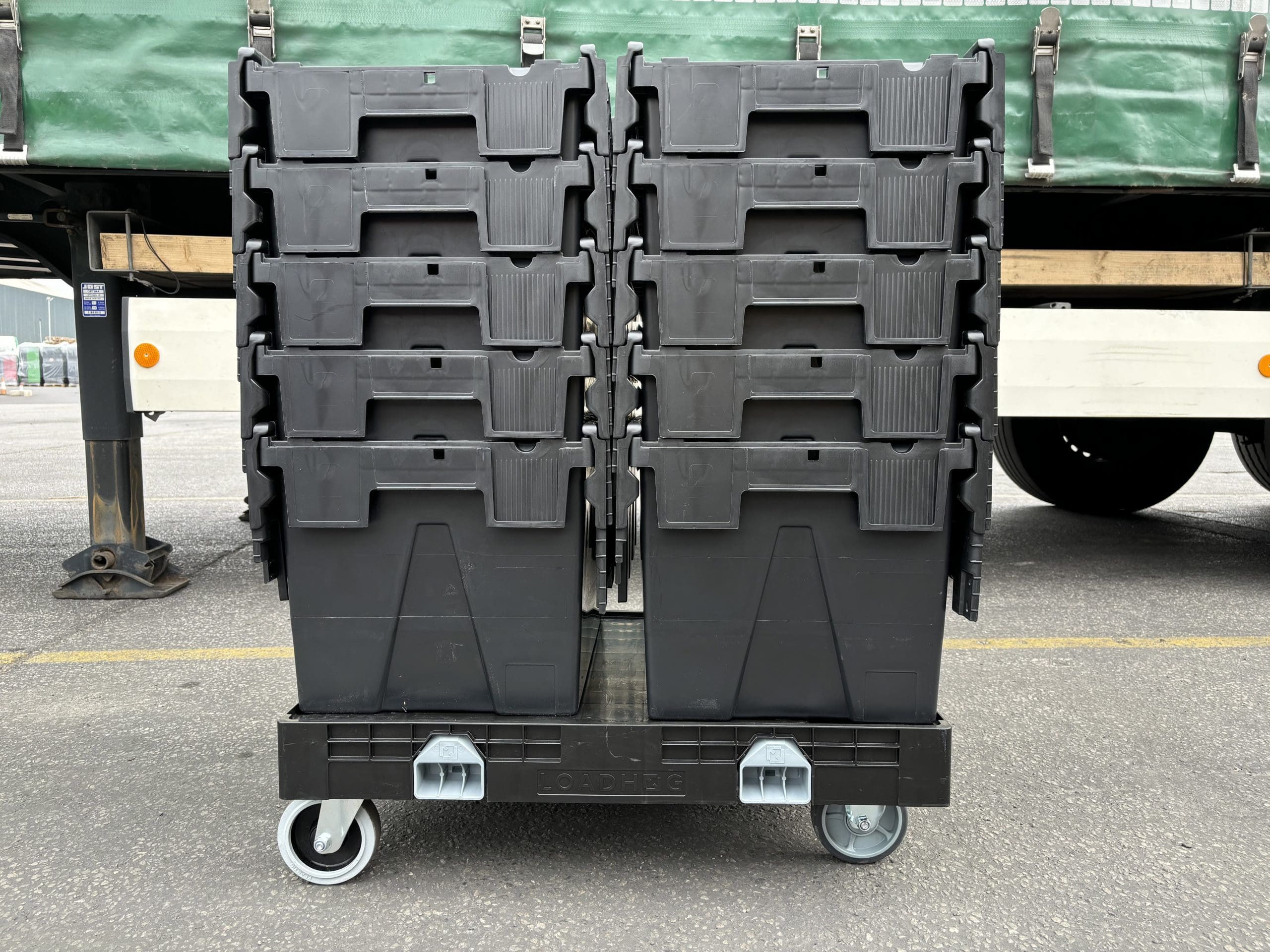 Attached lid totes on a wheeled platform