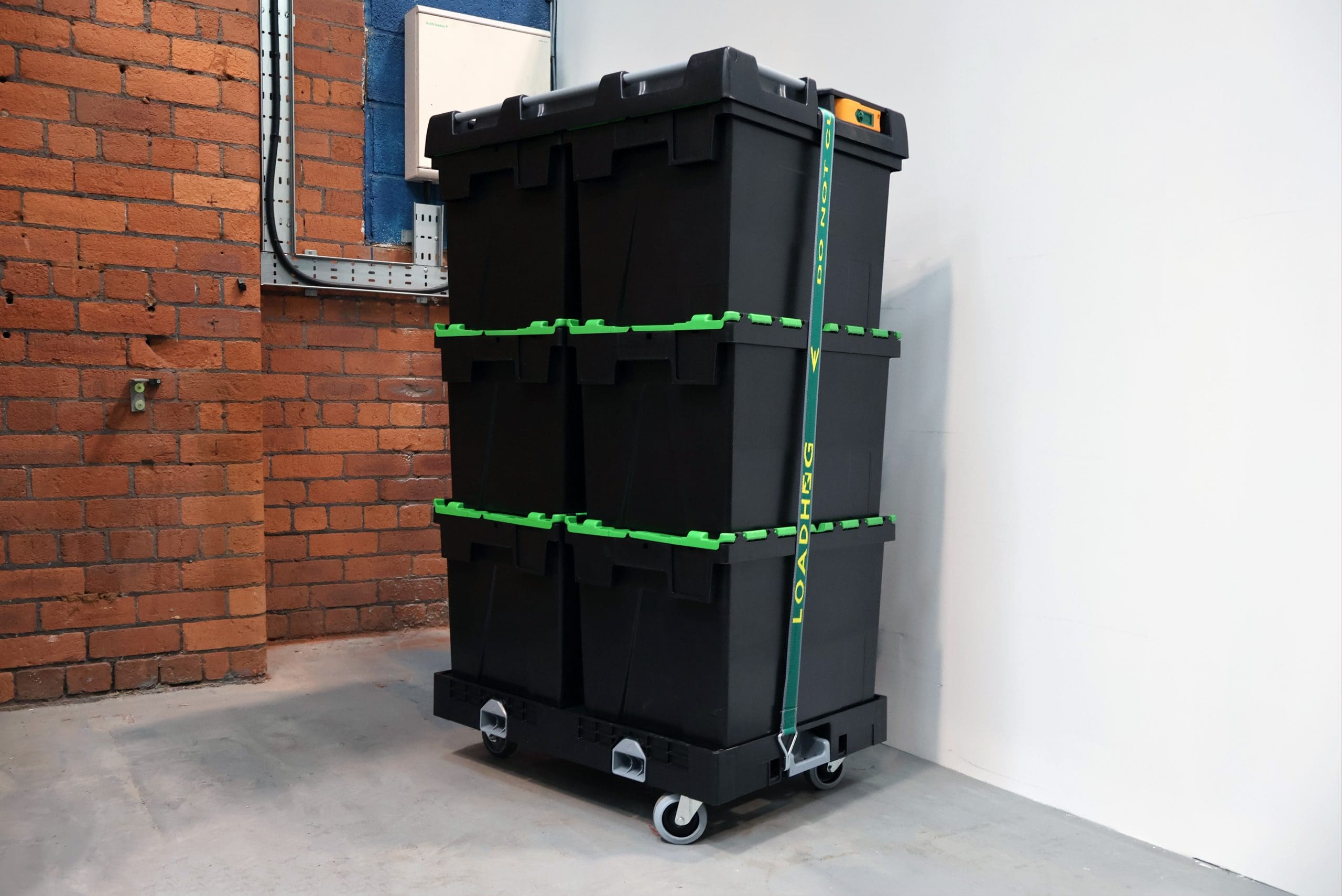 wheel platform with totes secured with pallet lid