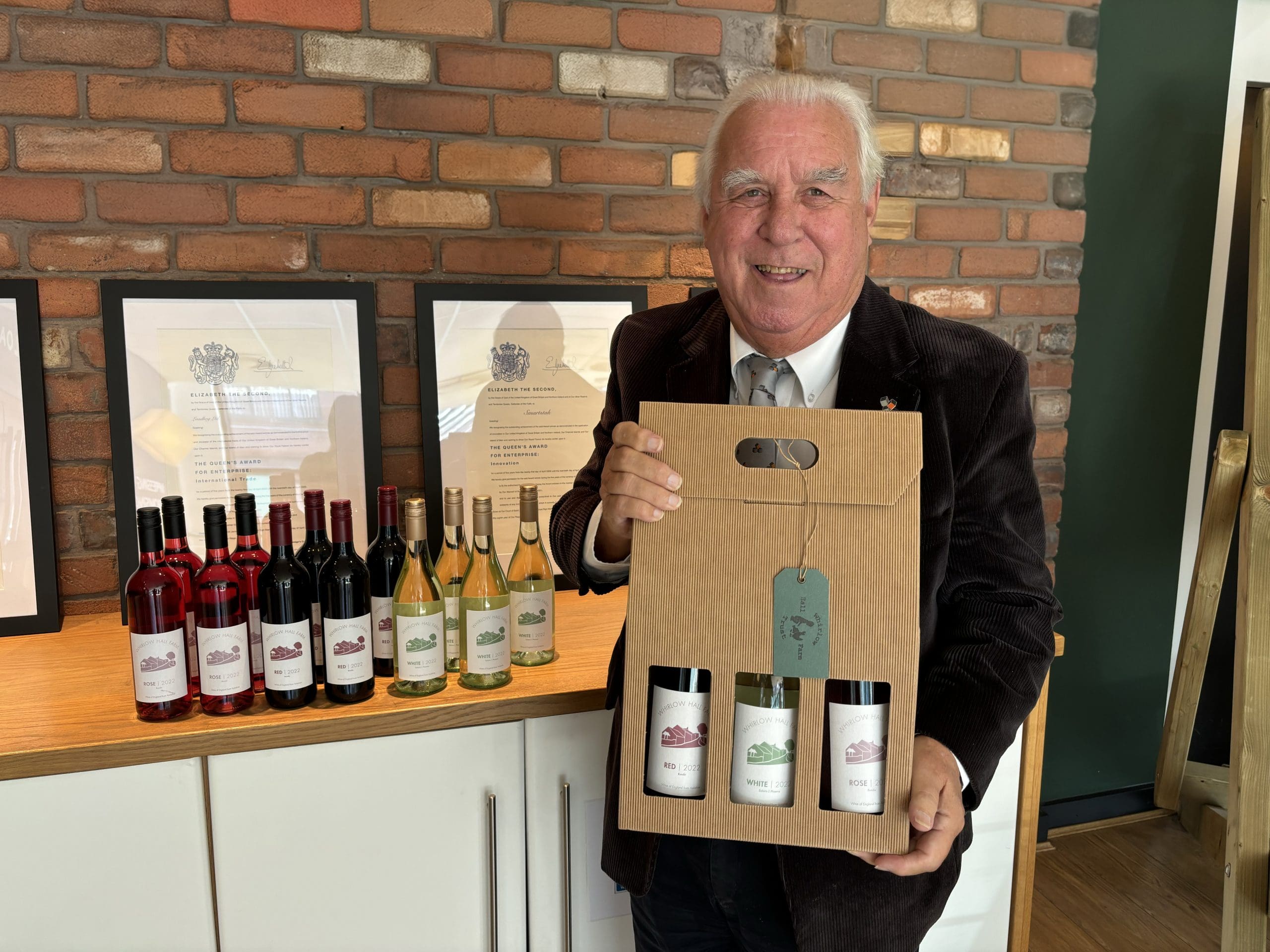 Hugh Facey with glass wine bottles at Loadhog