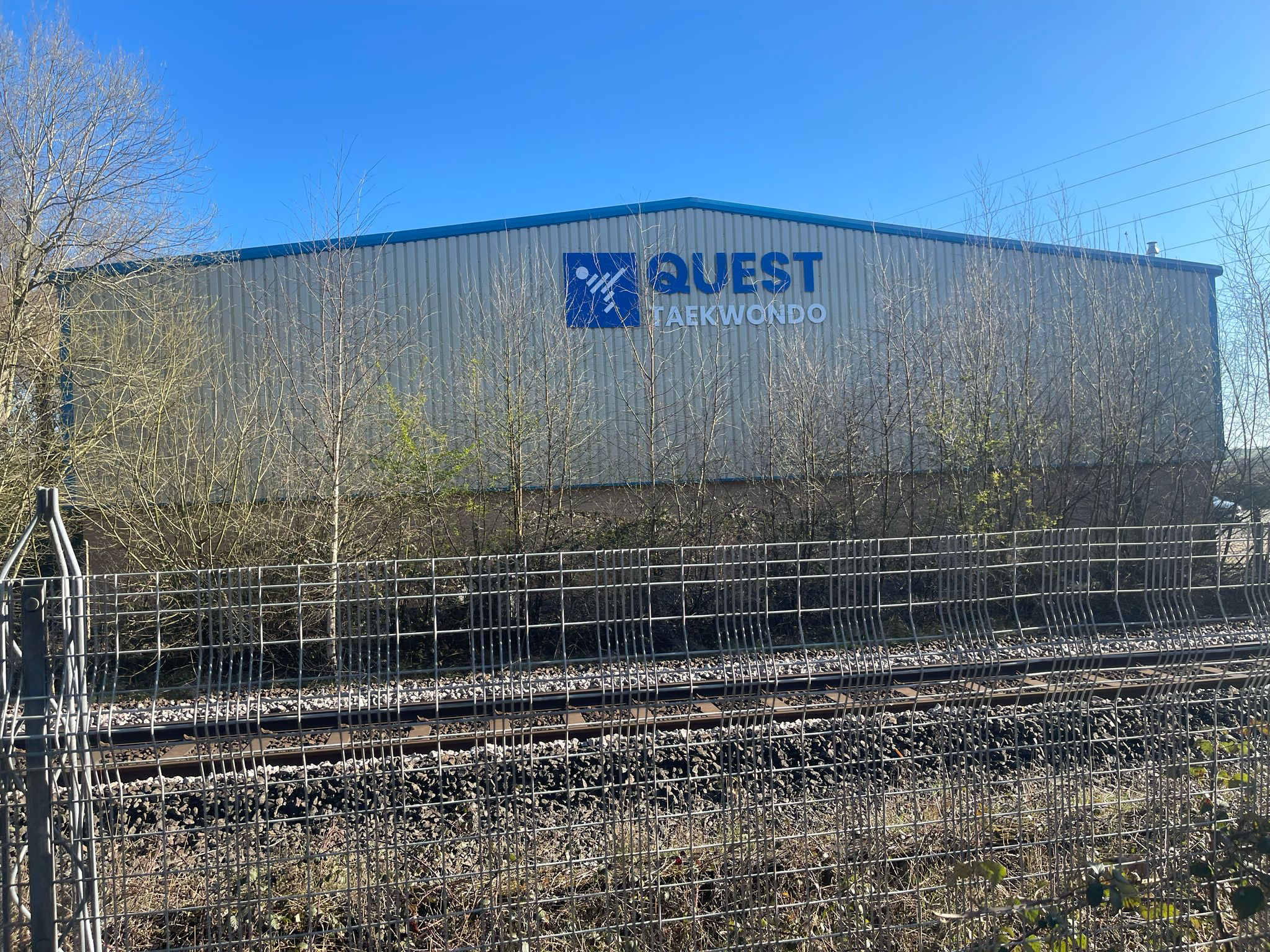 new sign for Quest Taekwondon sponsored by Loadhog